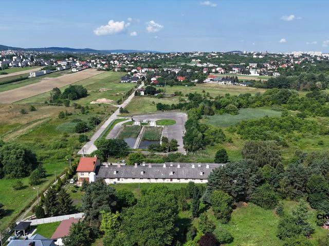 Sprzedam dużą działkę 4849 m² z domem i potencjałem inwestycyjnym