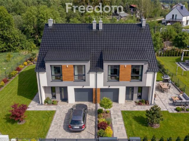 Sprzedam nowoczesny dom bliźniaczy 141 m² z garażem i dużym ogrodem