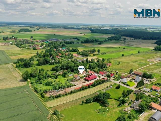 Sprzedam siedlisko 5624 m² z domem i budynkami w Rynie