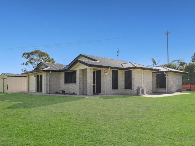Sprawling acreage with lawn maintenance included!