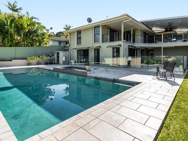 Sprawling entertainer's sanctuary with pool and rare multi car storage