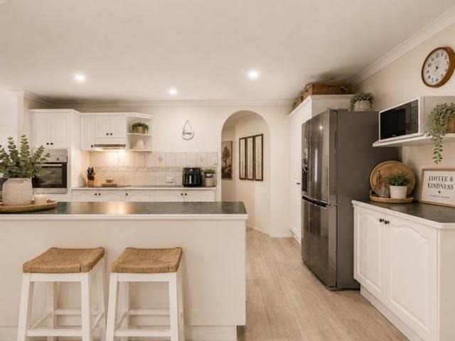 Sprawling Family Living with a Backyard of Opportunity!