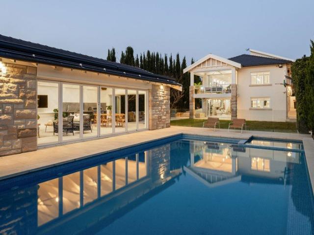 Sprawling Hamptons Style Family Home Reminiscent of a Grand Highlands Estate
