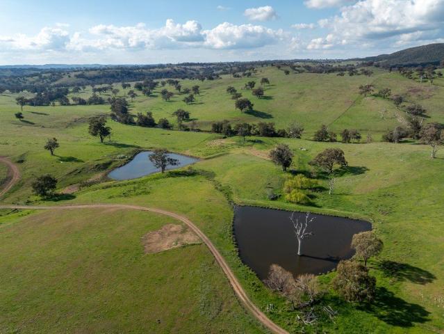 Spring Creek Bowan Park 550 acres, dual creek frontage, building entitlements