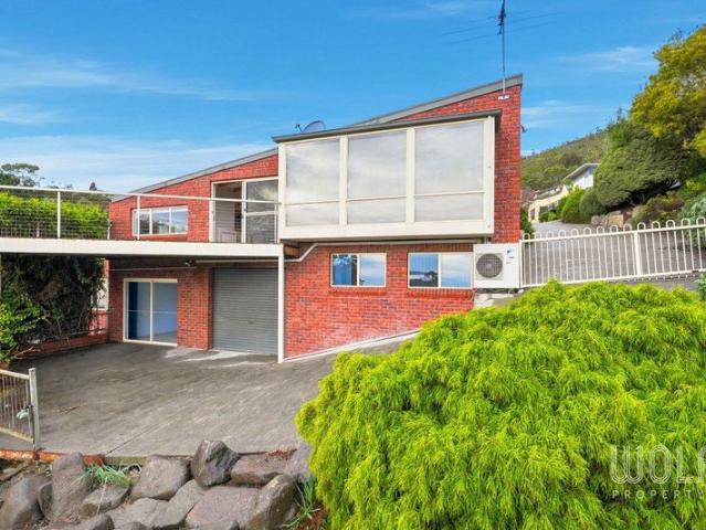 Sweeping Views, Flexible Living, Premier Sandy Bay Address!