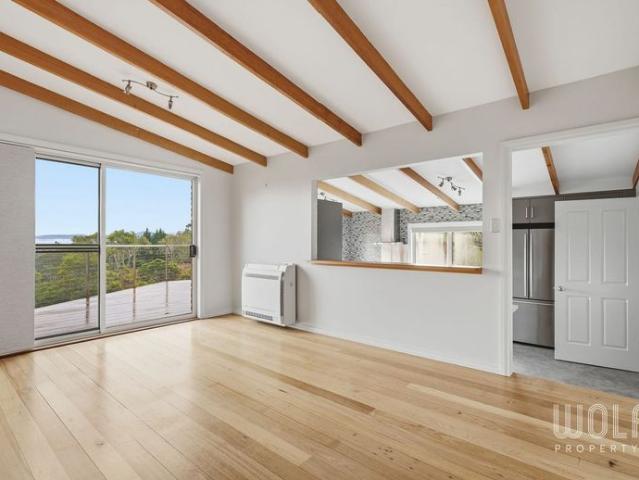 Sweeping Views, Flexible Living, Premier Sandy Bay Address!