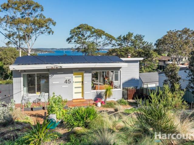Sweeping Lake Views from Character filled Family Haven