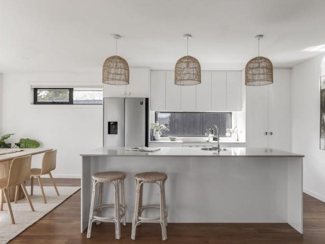 Sweeping mountain views, open plan living, private backyard within easy walk to school, parks and shops