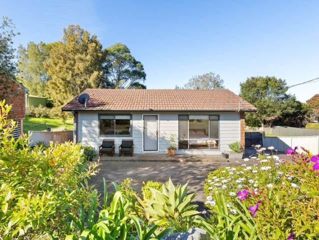 Sweet, Single Level Cottage with an Income.