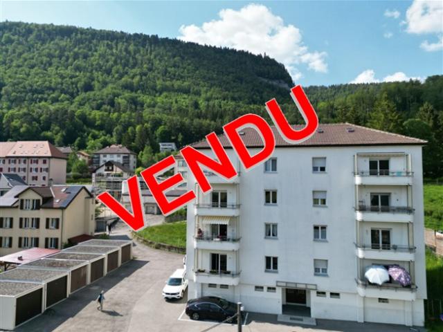 St Imier, Gebäude 8 App, 6 Garagen 5,7% Rendite voll vermietet