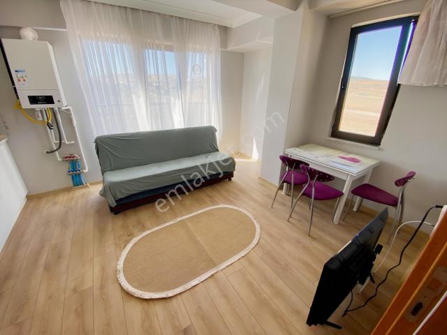 Stm'den Yeni Mahallede Asansörlü Ara Kat Eşyalı Kiralık 1+1