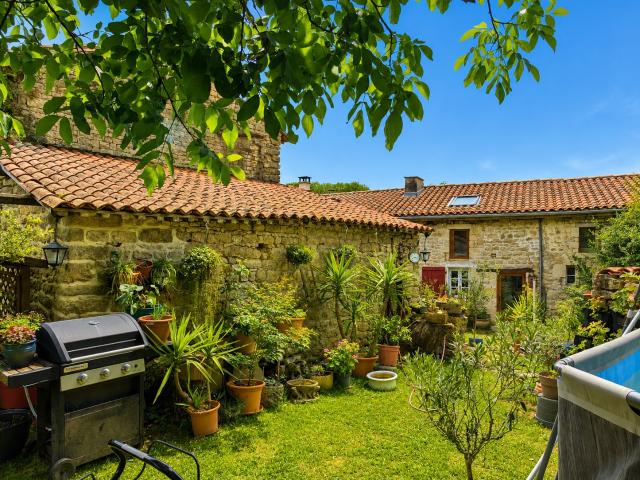 Stone house with private garden, outbuildings and barn in Mansle 16