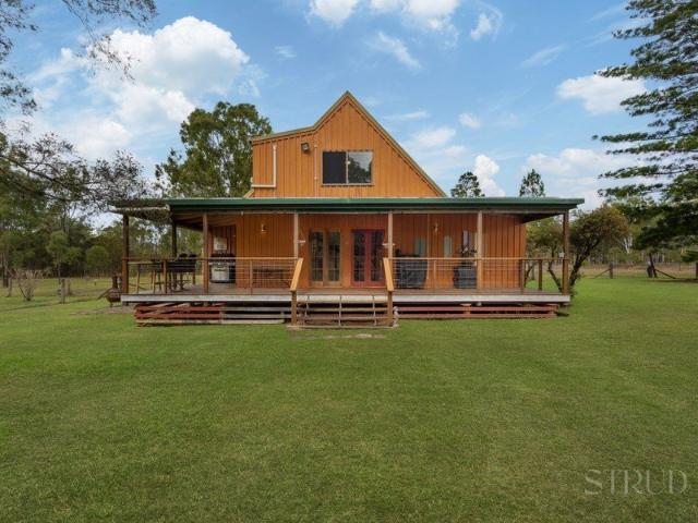 Storybook Cottage Charm on Spacious Acreage