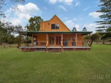 Storybook Cottage Charm on Spacious Acreage