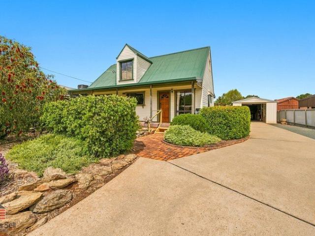 Storybook Cottage Living with Mezzanine Loft & Private Gardens