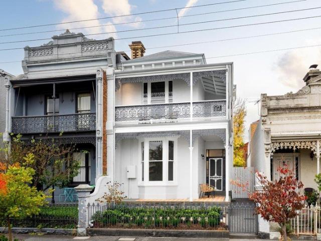 Stately double storey Victorian home in a blue chip Carlton North enclave