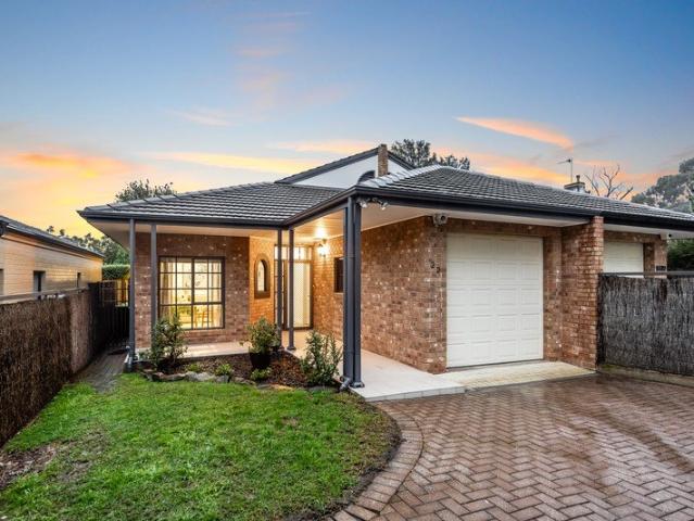 Stay close in a dual level, garden wrapped home that feels worlds away