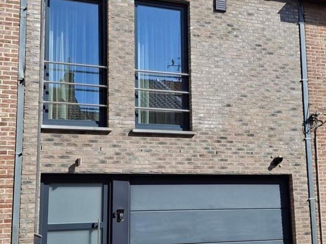 Stadswoning met garage en stadstuin in hartje Maaseik
