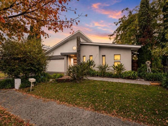 Standout Living in the Highly Sought After Fallingwater Estate with Space and Style