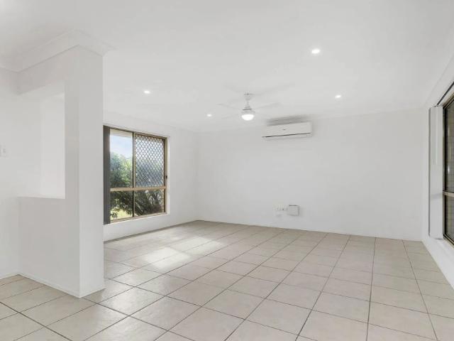 Step into comfort and convenience in this beautifully maintained low set brick home, ideal for families seeking space and functionality