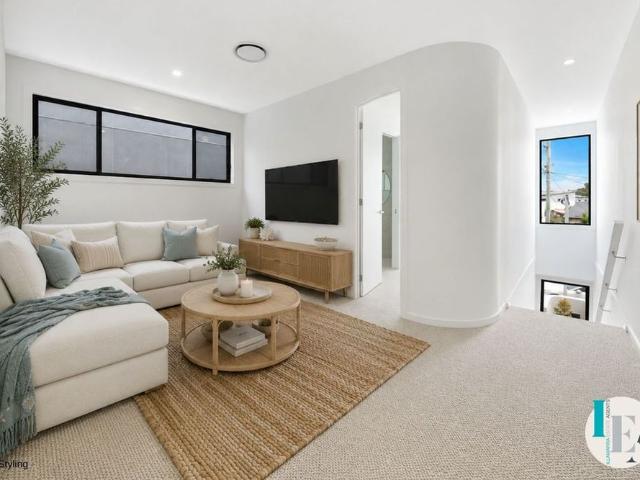 Step Into Stylish Coastal Living, Minutes from the Lake