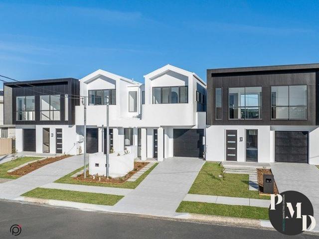 Step Into Stylish Coastal Living, Minutes from the Lake