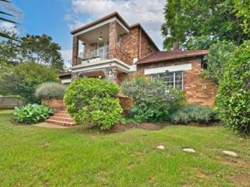 step into this captivating home, bur.