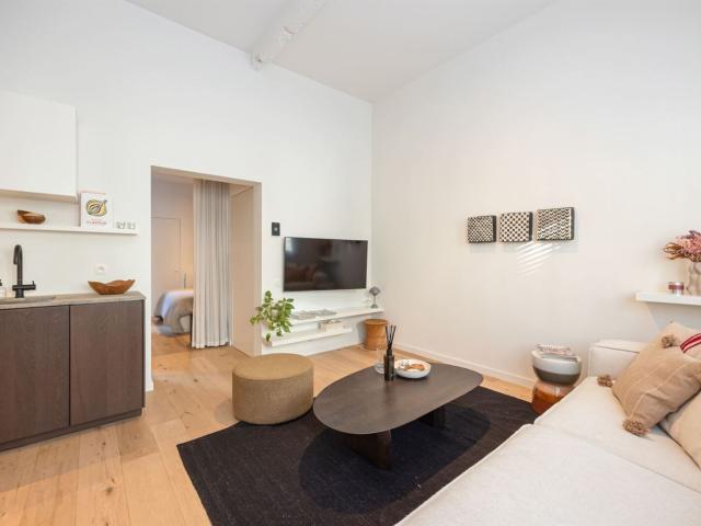 Stijlvol éénslaapkamer appartement met terras