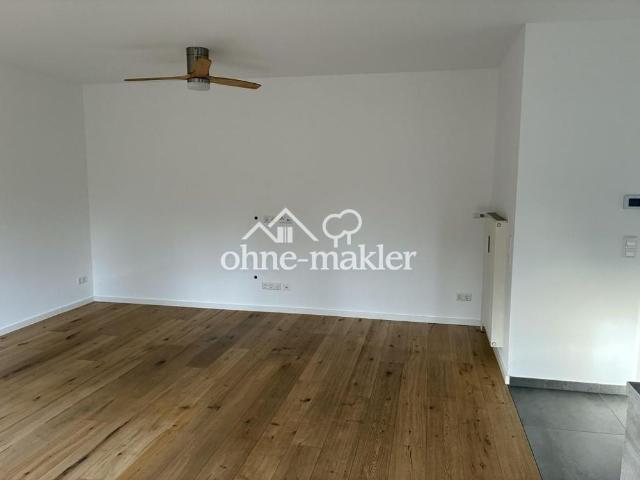 Stillvolle 2 Zimmer Erdgeschosswohnung mit Südterrasse und eigenem Garten