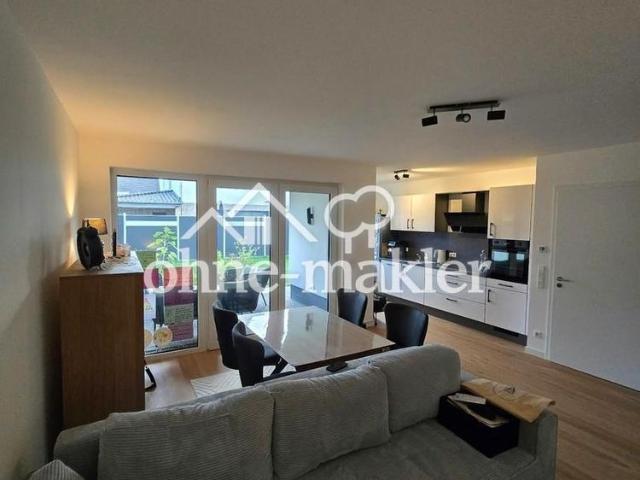 Stillvolle 4 Zimmer EG Neubauwohnung KFW 40 Wärmep.+PV mit Terrasse, Garten, Parkplatz