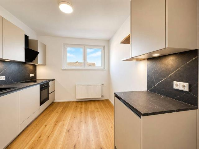 Stilvoll traumhaft saniert | 3 Zimmer Dachgeschosswohnung mit West Loggia | DAN Küche vollausgestattet | Tiefgaragenplatz