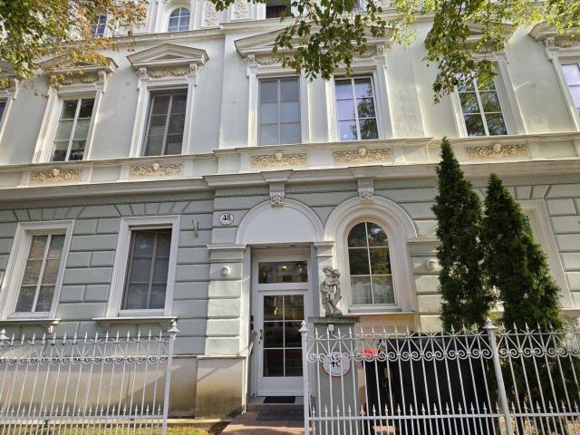 Stilvoll wohnen in Baden – charmante Eigentumswohnung im historischen Altbau