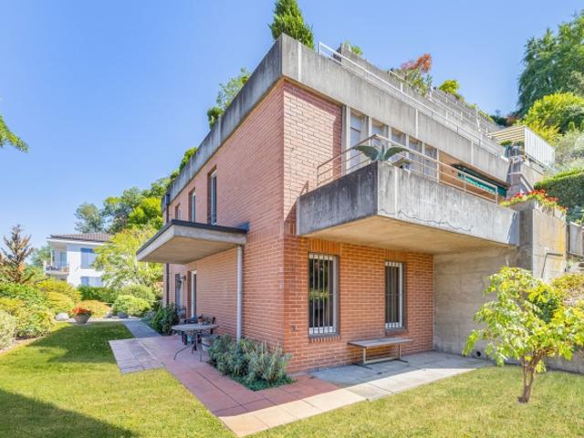 Stilvoll wohnen in einem Terrassenhaus mit eigenem Garten