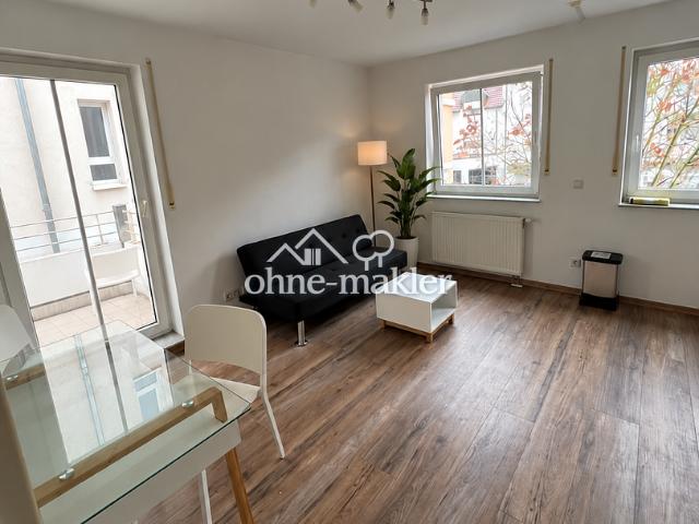 Stilvoll möblierte 2 Zimmer Wohnung mit Balkon in zentraler Innenstadtlage inkl. TG Stellplatz