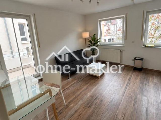 Stilvoll möblierte 2 Zimmer Wohnung mit Balkon in zentraler Innenstadtlage inkl. TG Stellplatz