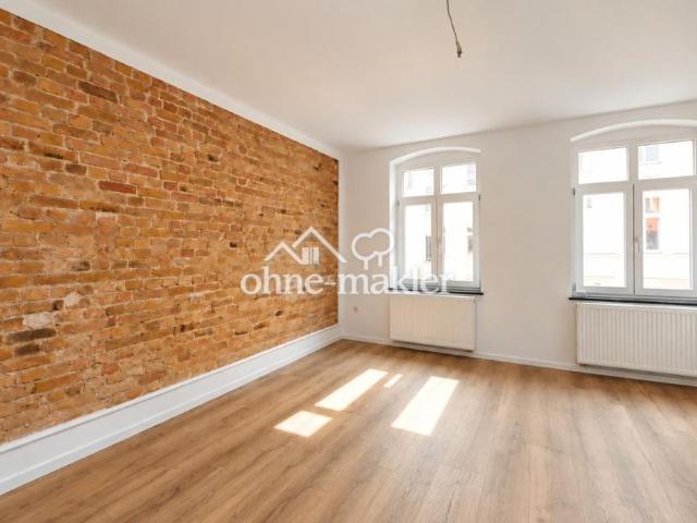 Stilvoll sanierte 3 Zimmer Wohnung mit Kaminofen, Sichtziegelwänden & hochwertigem Bad