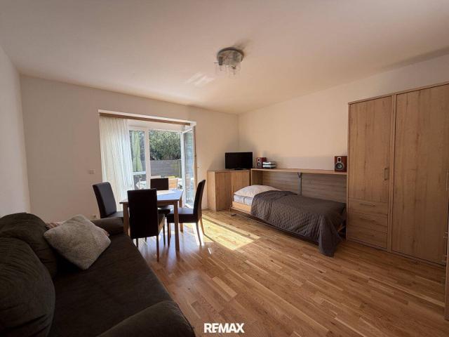 Stilvolle 1 Zimmer Wohnung mit Terrasse und Eigengarten