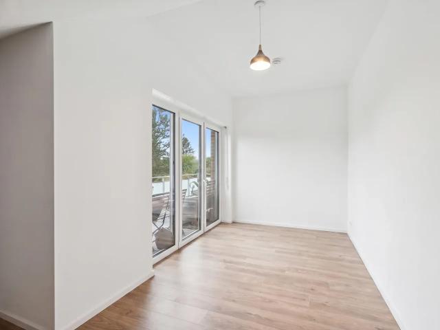 Stilvolle 4 Zimmer Wohnung mit großzügiger Dachterrasse und Blick ins Grüne