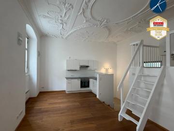 Stilvolle Galeriewohnung mit einzigartigem Altbauflair