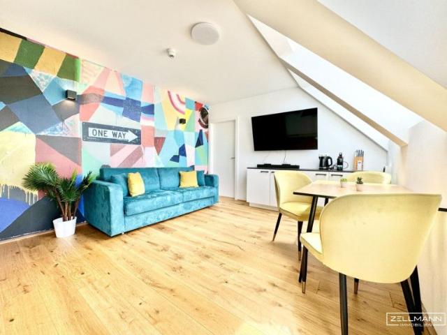 Stilvolle Dachgeschossresidenz mit hochwertiger Ausstattung und urbanem Wohnkomfort | ZELLMANN IMMOBILIEN
