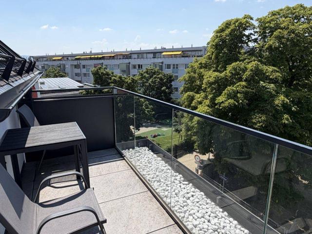 Stilvolle Dachgeschossresidenz mit hochwertiger Ausstattung und urbanem Wohnkomfort | ZELLMANN IMMOBILIEN