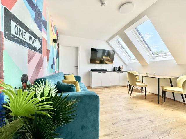 Stilvolle Dachgeschossresidenz mit hochwertiger Ausstattung und urbanem Wohnkomfort | ZELLMANN IMMOBILIEN