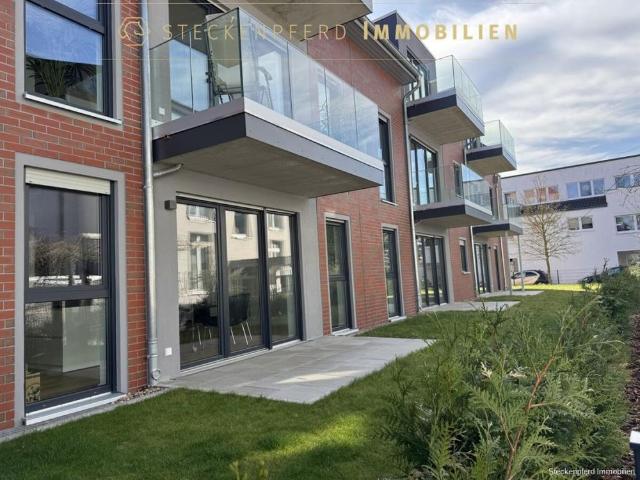 Stilvolle EG Wohnung mit Garten für anspruchsvolle Mieter mit EBK und Wallbox im schicken Neubau!
