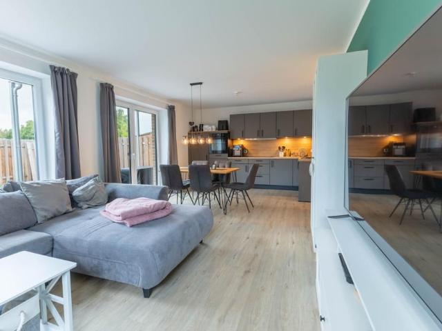 Stilvolle Erdgeschosswohnung mit großzügiger Terrasse und Garten in Weddingstedt zu vermieten