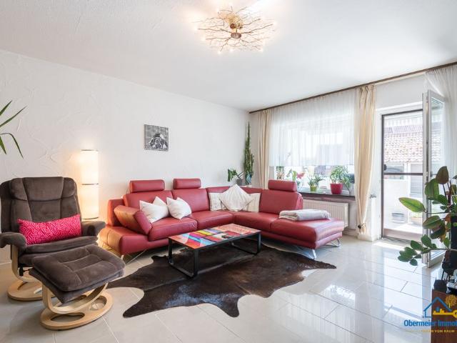 Stilvolle Erdgeschosswohnung mit Loggia & Garten in ruhiger Lage