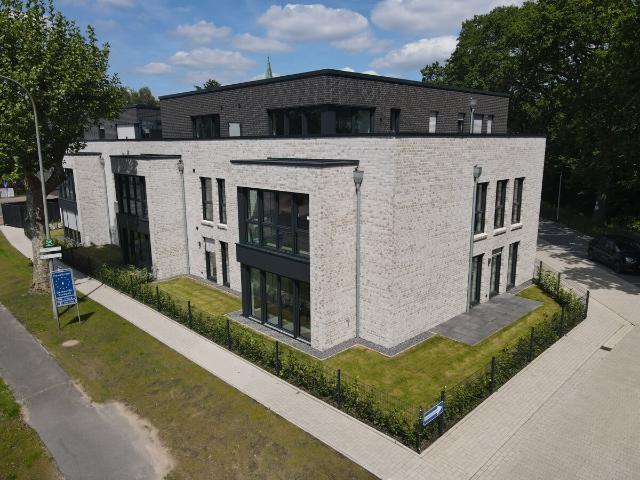 Stilvolle Neubauwohnung mit 4 Zimmern, Terrasse und Garten zu verkaufen!