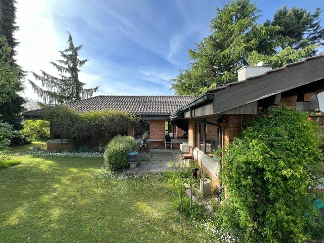 Stilvoller 5.5 Zimmer Bungalow mit charmantem Garten und Garage