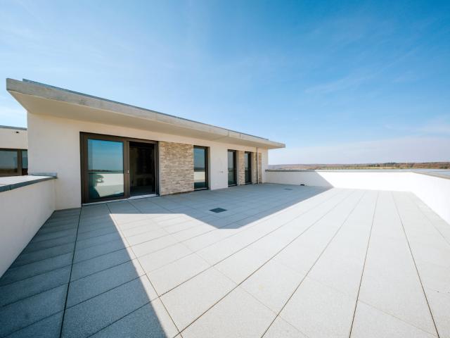 Stilvolles Penthouse mit beeindruckender Dachterrasse und lichtdurchfluteten Räumen