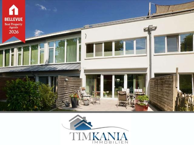 Stilvolles Reihenmittelhaus in moderner Architektur mit Studio und sonniger Dachterrasse