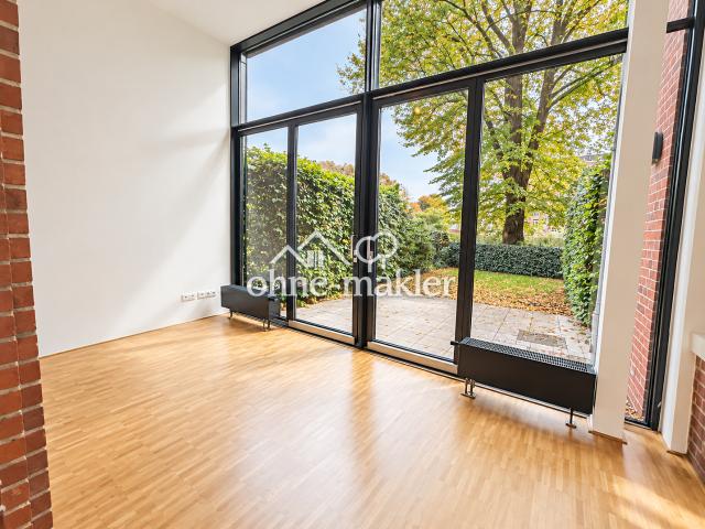 Stilvolles Wohnen im denkmalgeschützten Quartier 21 – 3 Zimmer Wohnung mit Terrasse und Garten
